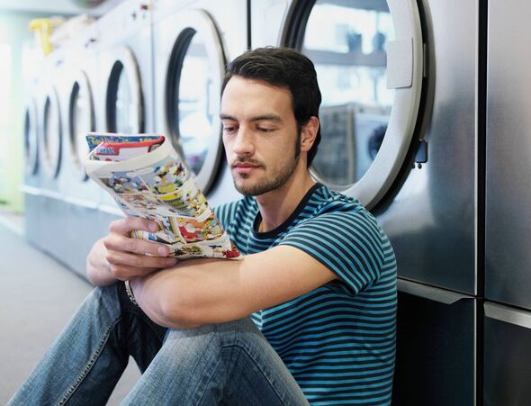 Man reading comic book